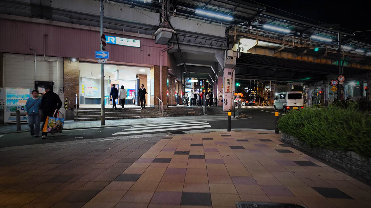 Night lane near Fukushima Station, where modern high-rises and old downtown townscape exist side by side