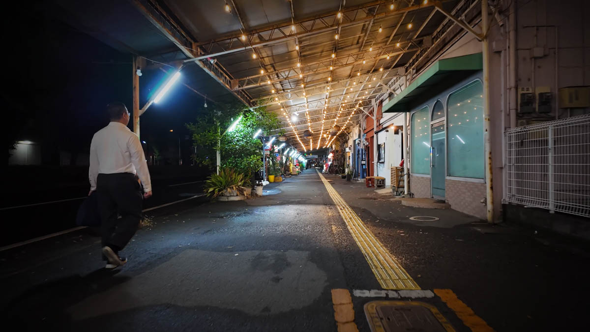 Decorative lights along Burakuri-cho, with a few bars and restaurants lit up