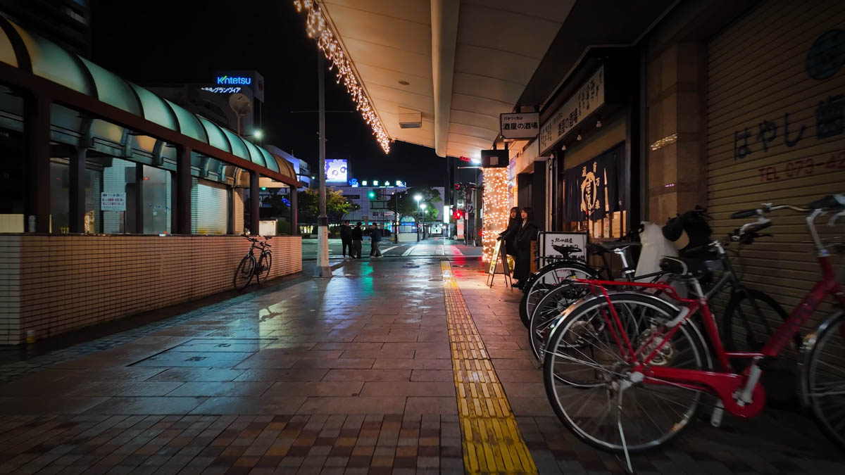 Girls bar staff standing outside near Wakayama Station