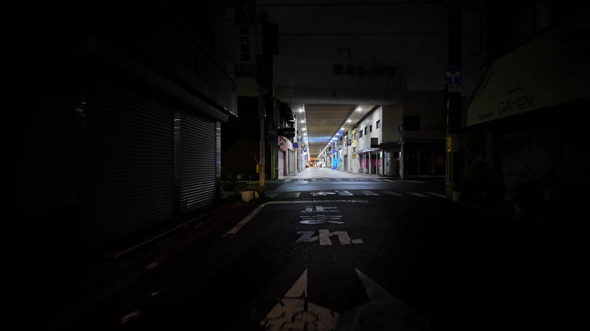 The vast Burakuri-cho covered arcade at night, almost empty of people