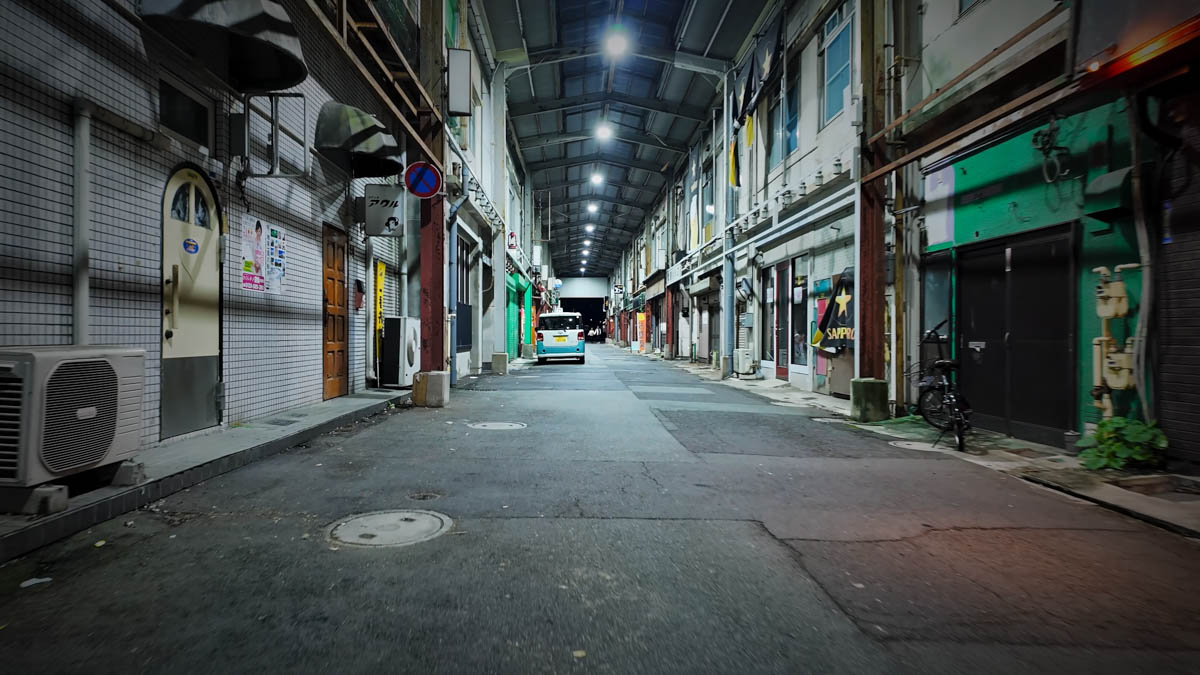 Showa-era covered arcade A dramatically Showa-era covered arcade at night