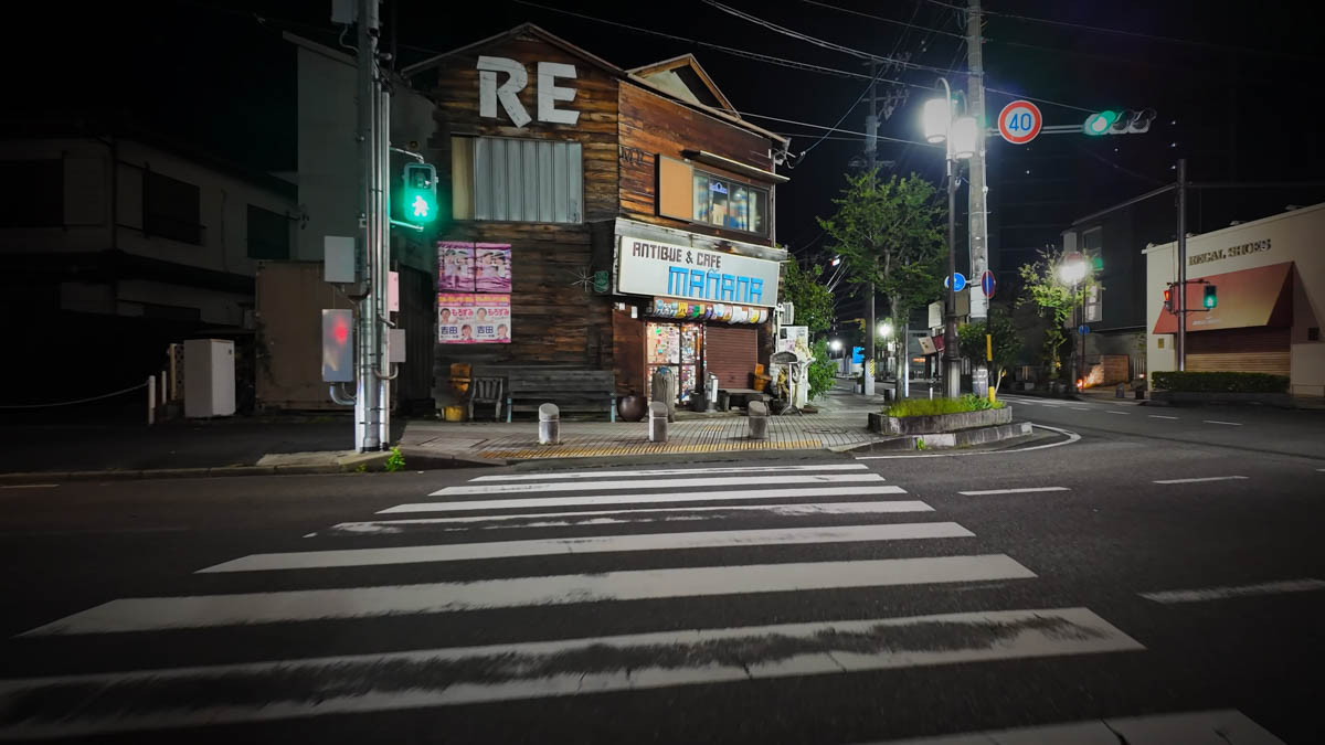 Antique shop and café exterior An antique shop and café at night, closed but with an attractive exterior