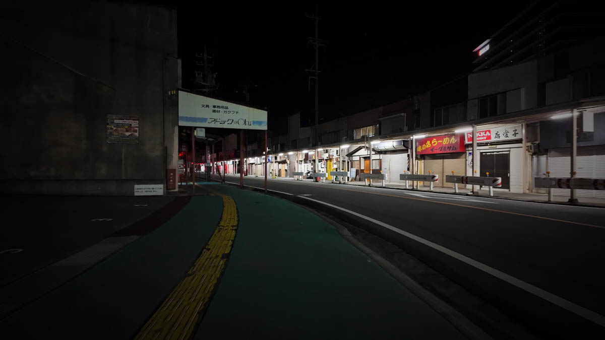 Shopping street at night A shopping street at night, most shutters pulled down