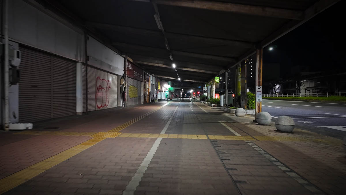 Graffiti on the shopping street shutters Shutters with graffiti in the shopping street