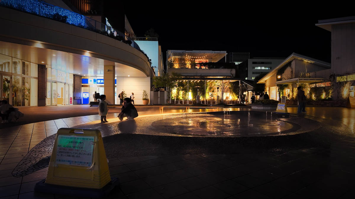 Terrace Mall Shonan at night, lit up with the illuminated Christmas tree glowing in front