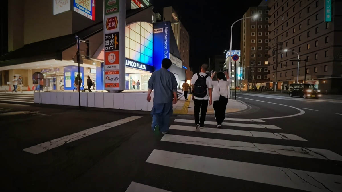 Alpico Plaza and Matsumoto Bus Terminal, with people on the crosswalk