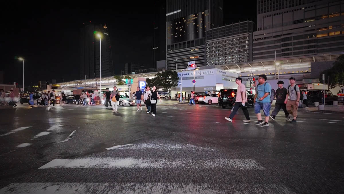 Arrivals crossing Wet crosswalk in front of the arrivals canopy