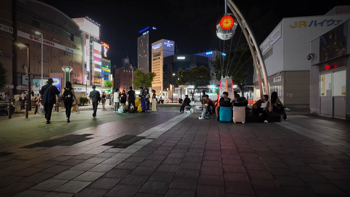 Taiko-dori plaza Bic Camera, the JR highway bus terminal, and a clock on a silver arch